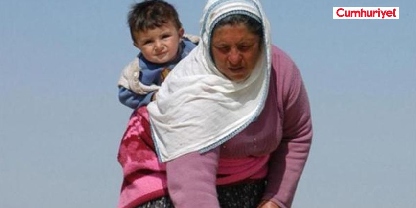 YÜK KADININ SIRTINDA